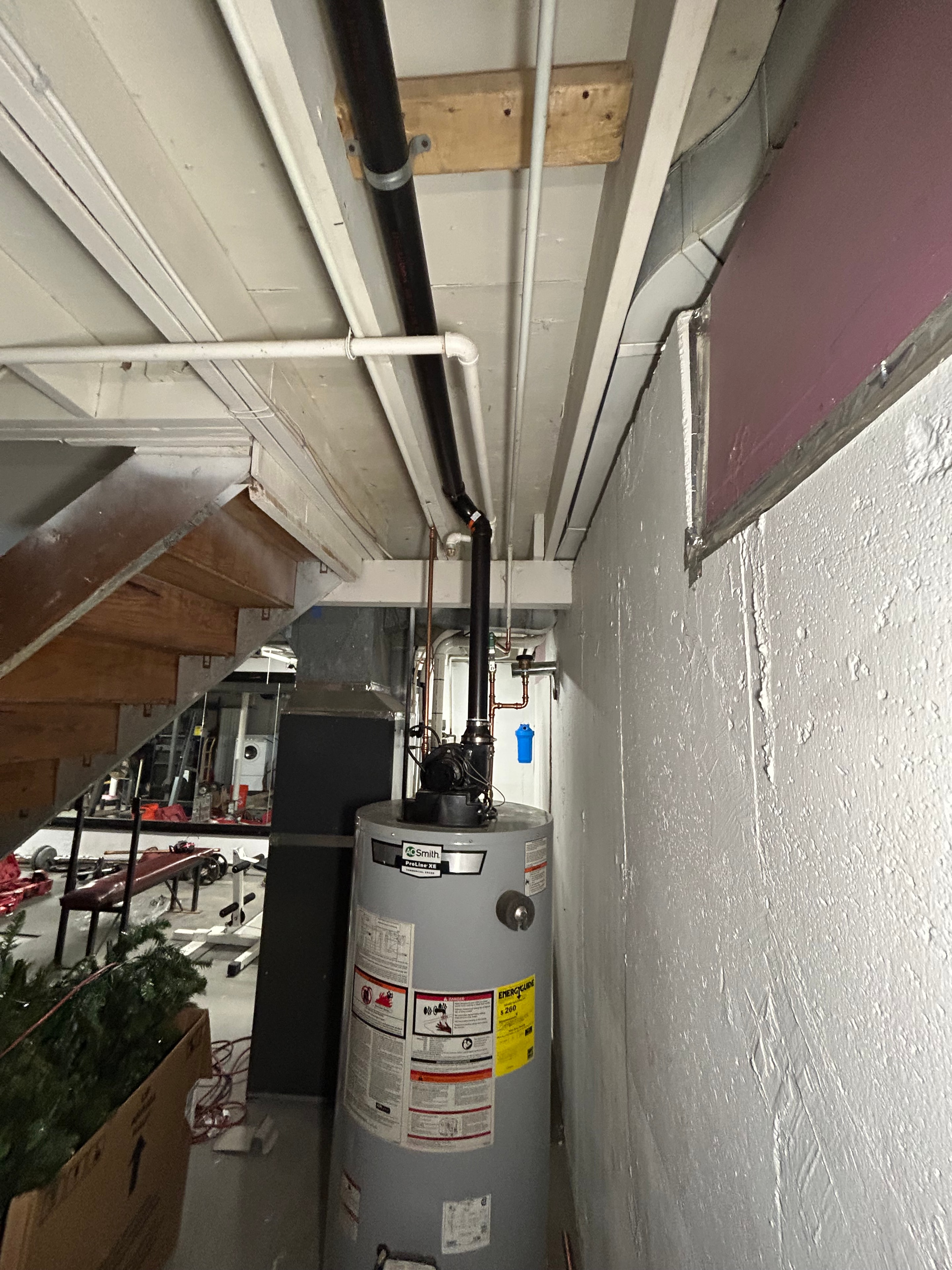 A.O. Smith water heater installation in basement utility space — Sears Mechanical